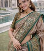 Green gold silk blend jacuard work designer party wear saree with unstitched blouse piece
