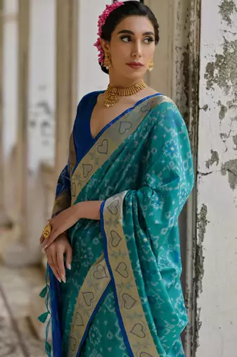 Firozi soft raw silk zari woven saree with blouse