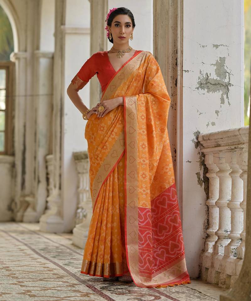 Orange soft raw silk zari woven saree with blouse