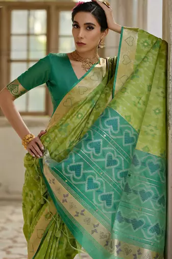 Green soft raw silk zari woven saree with blouse