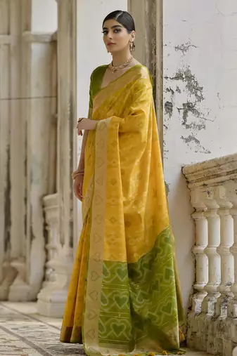 Yellow soft raw silk zari woven saree with blouse