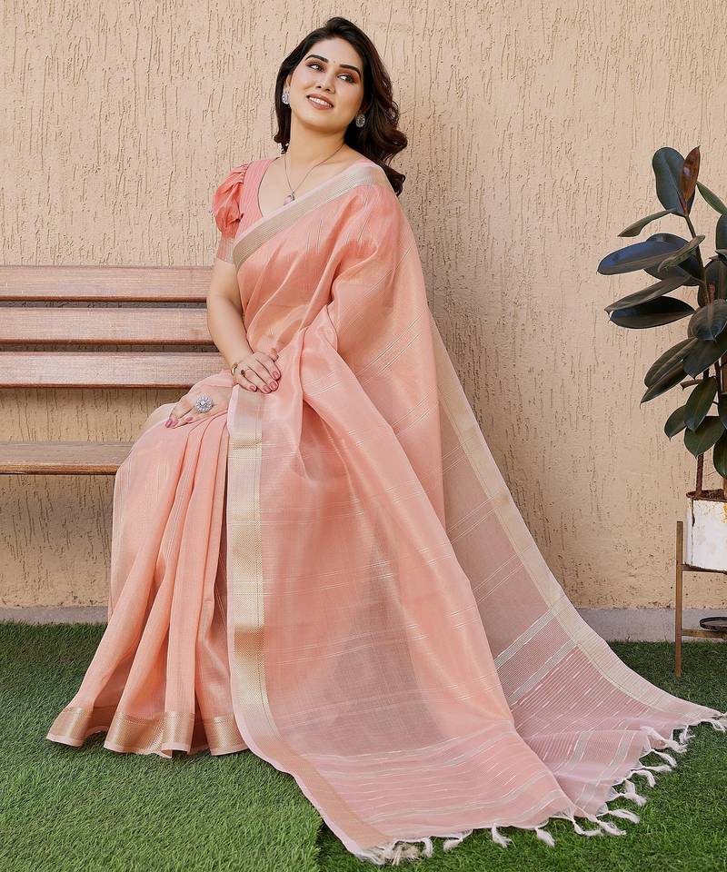 Peach soft tissue linen silk zari woven saree with blouse