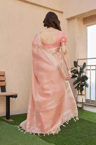 Peach soft tissue linen silk zari woven saree with blouse