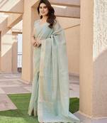 Sea green soft tissue linen silk zari woven saree with blouse