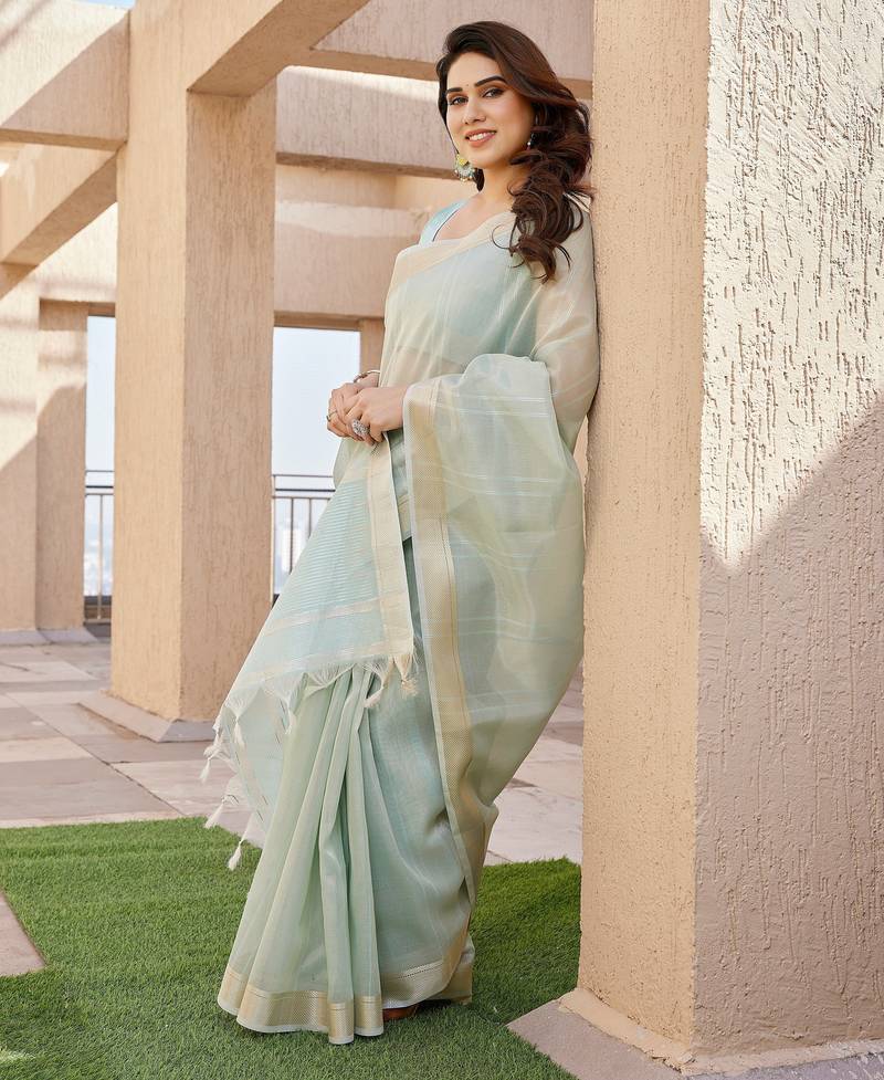 Sea green soft tissue linen silk zari woven saree with blouse