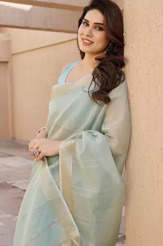 Sea green soft tissue linen silk zari woven saree with blouse