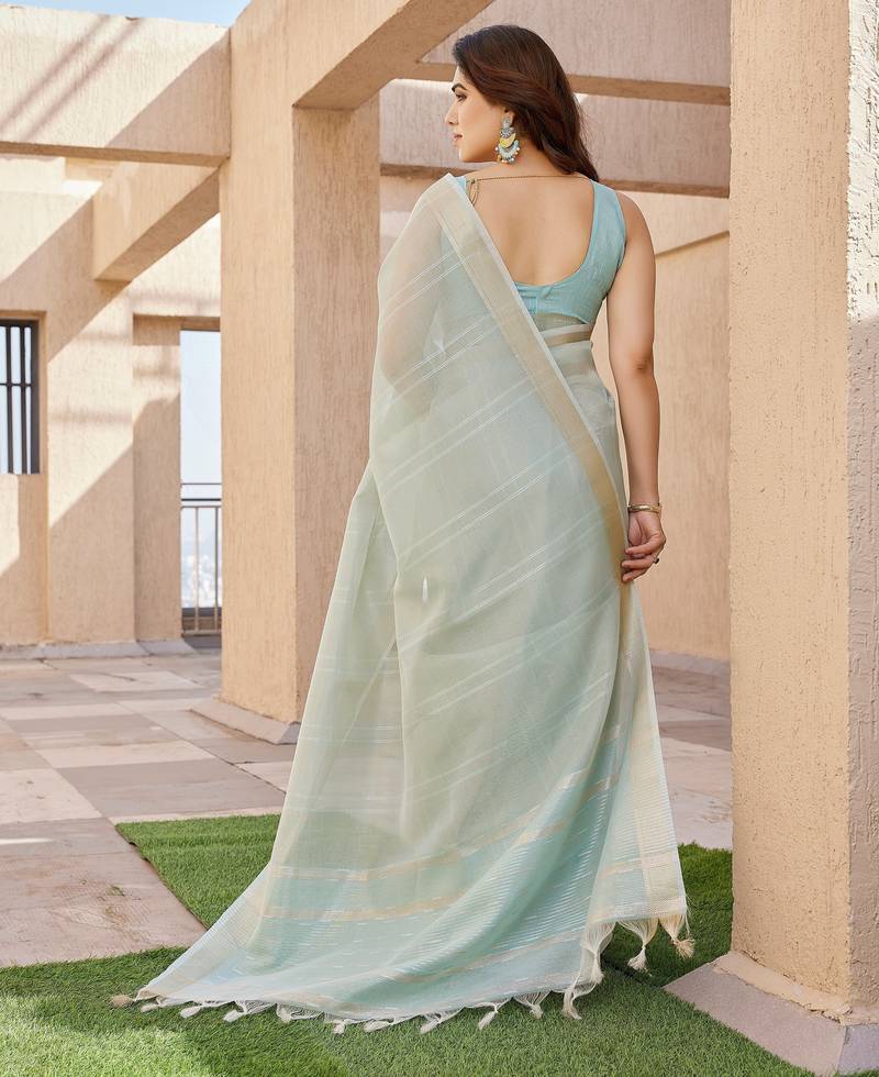 Sea green soft tissue linen silk zari woven saree with blouse