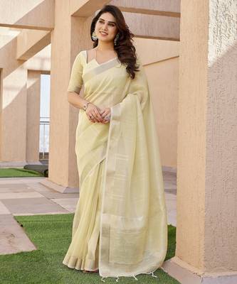 Yellow soft tissue linen silk zari woven saree with blouse 1