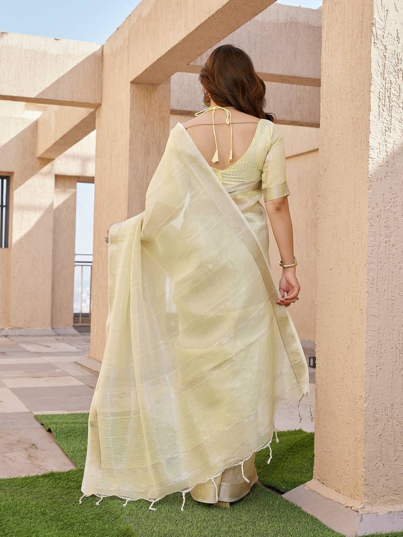Yellow soft tissue linen silk zari woven saree with blouse