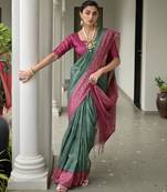 Bottle green soft tussar silk ikkat printed saree with blouse