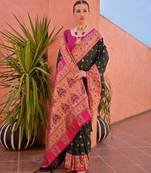 Bottle green paithani silk zari woven saree with blouse