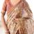 Beige handloom cotton saree with rust blouse and village celebration print