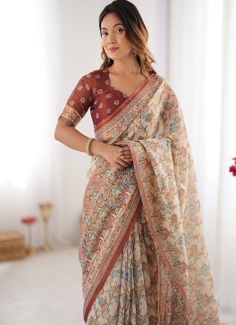 Beige & maroon handloom cotton saree with multicolor floral print and majestic bird art pallu
