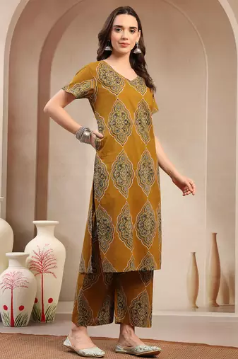 Women yellow printed straigth kurta with pyjama  set stitched