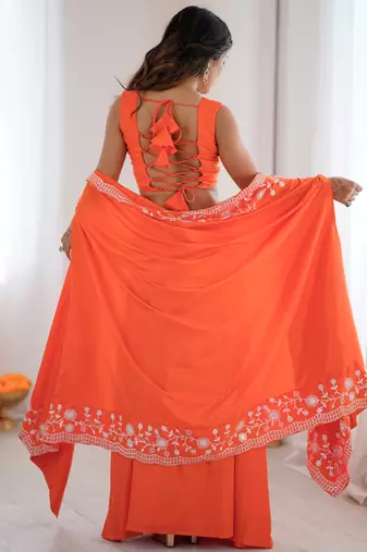 Beautiful Orange Crepe Designer Lehenga Choli With Sequins Shrug