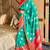 green color art silk saree with contrast blouse