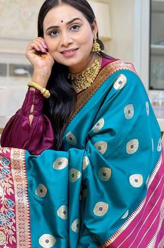 teal color art silk saree with contrast blouse