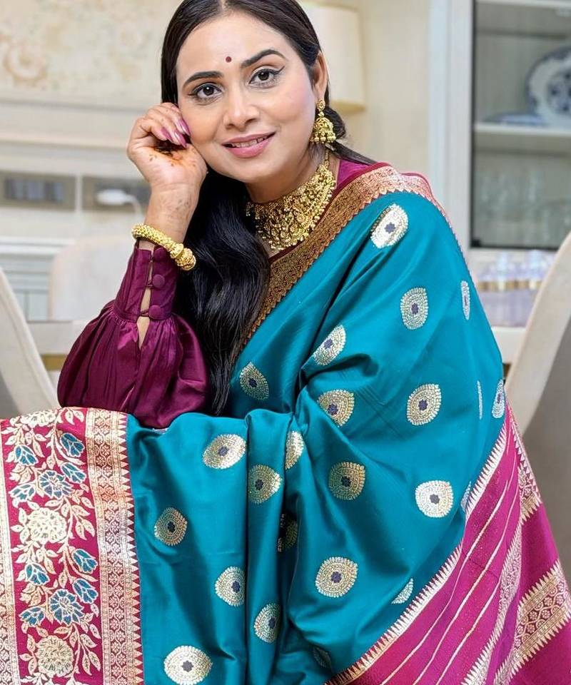 teal color art silk saree with contrast blouse