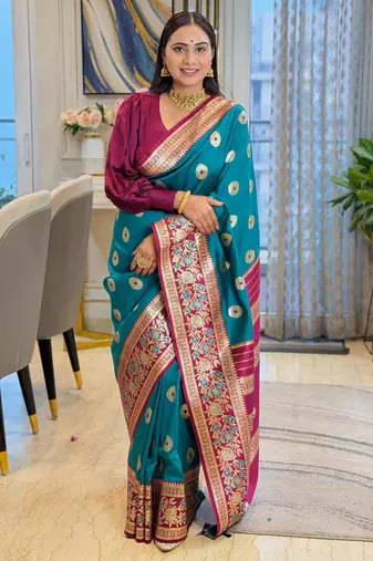 teal color art silk saree with contrast blouse