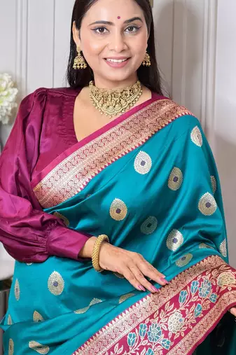 teal color art silk saree with contrast blouse