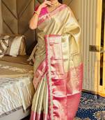 cream color tissue art silk saree with contrast blouse