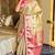 cream color tissue art silk saree with contrast blouse