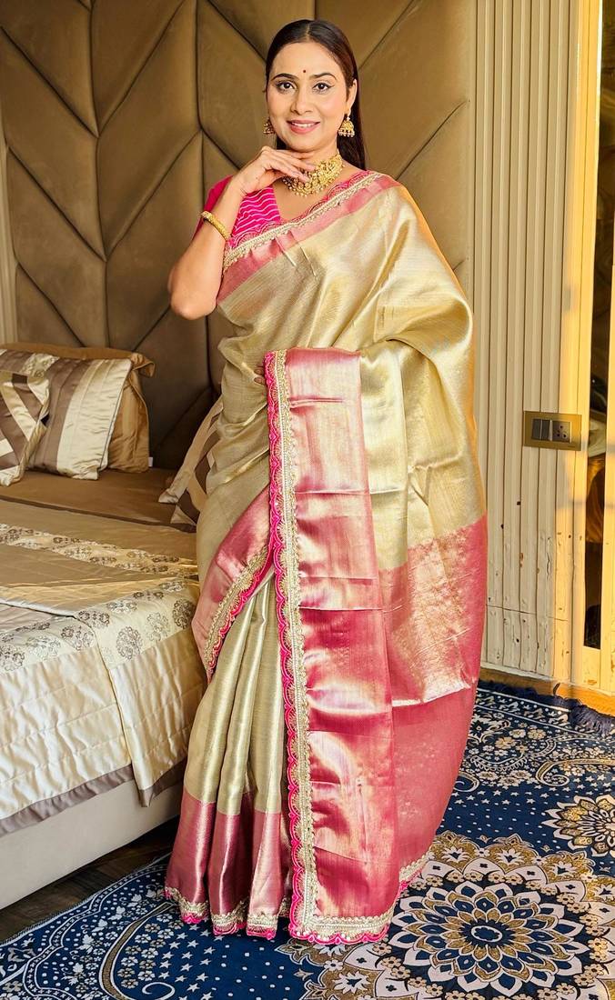 cream color tissue art silk saree with contrast blouse