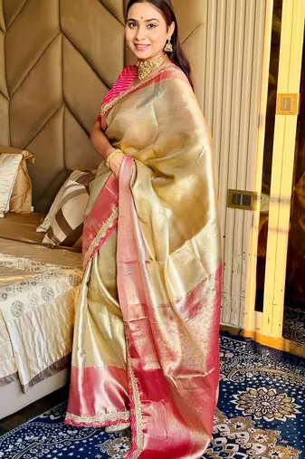 cream color tissue art silk saree with contrast blouse