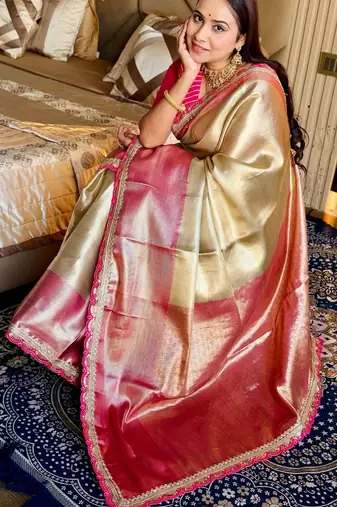 cream color tissue art silk saree with contrast blouse