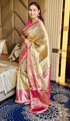 cream color tissue art silk saree with contrast blouse 5