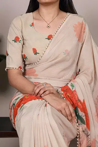 Graceful flow marble floral printed saree with delicate pearl lace