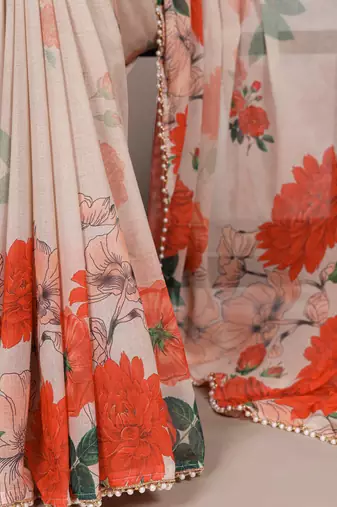 Graceful flow marble floral printed saree with delicate pearl lace