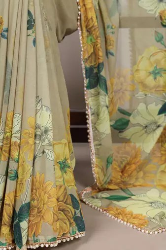 Graceful flow marble floral printed saree with delicate pearl lace