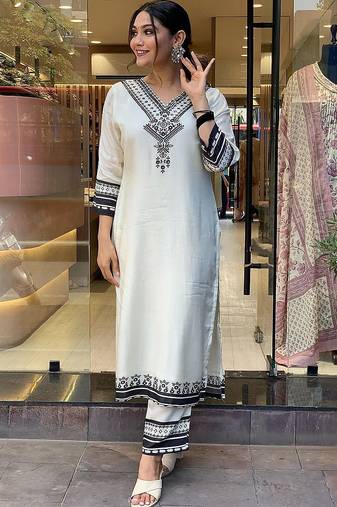 White color viscose rayon printed sttiched suit details