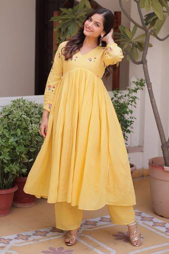 Yellow premium cotton embroidered kurti pant set for women