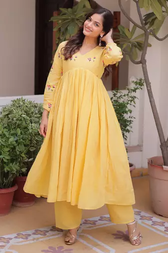 Yellow premium cotton embroidered kurti pant set for women