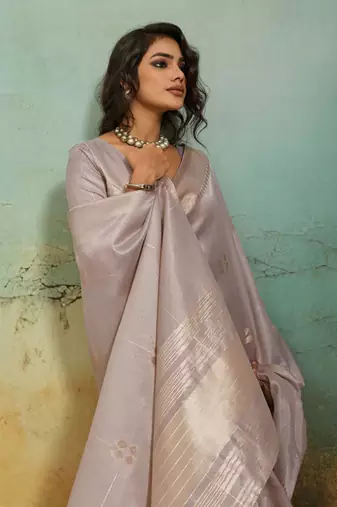 Light grey tissue infused linen saree with zari woven patta & chit pallu | small butti design