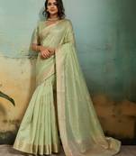 Light green tissue infused linen saree with zari woven patta & chit pallu | small butti design