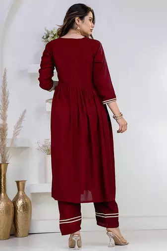 Maroon lace solid rayon stitched v-neck flared pant suit set