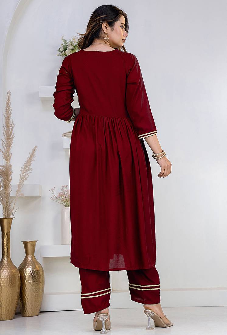 Maroon lace solid rayon stitched v-neck flared pant suit set