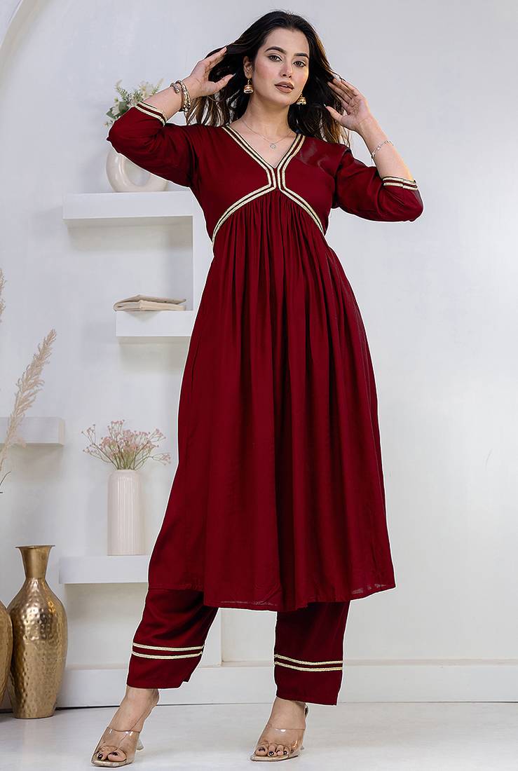 Maroon lace solid rayon stitched v-neck flared pant suit set