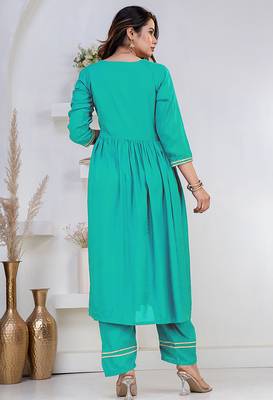 Green lace solid rayon stitched v-neck flared pant suit set 2