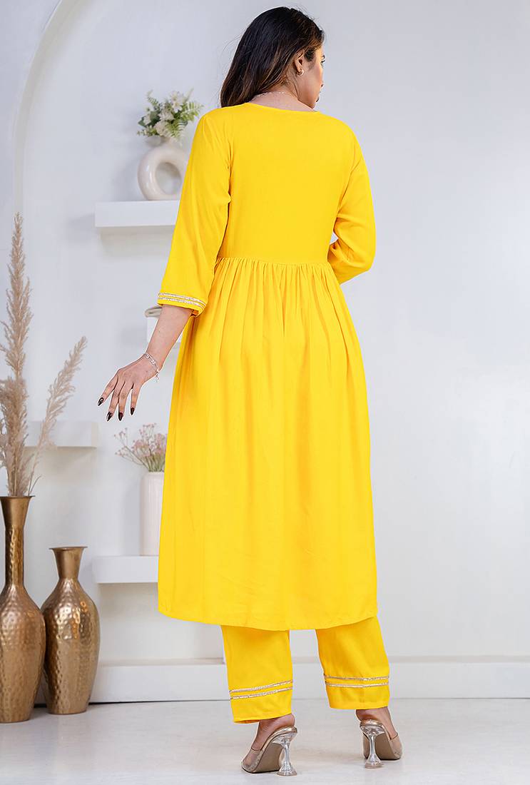Yellow lace solid rayon stitched v-neck flared pant suit set