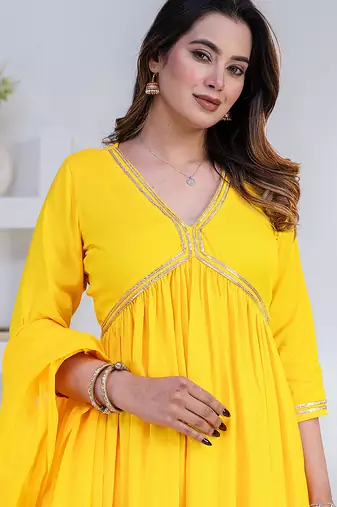 Yellow lace solid rayon stitched v-neck flared pant suit set