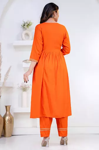 Orange lace solid rayon stitched v-neck flared pant suit set