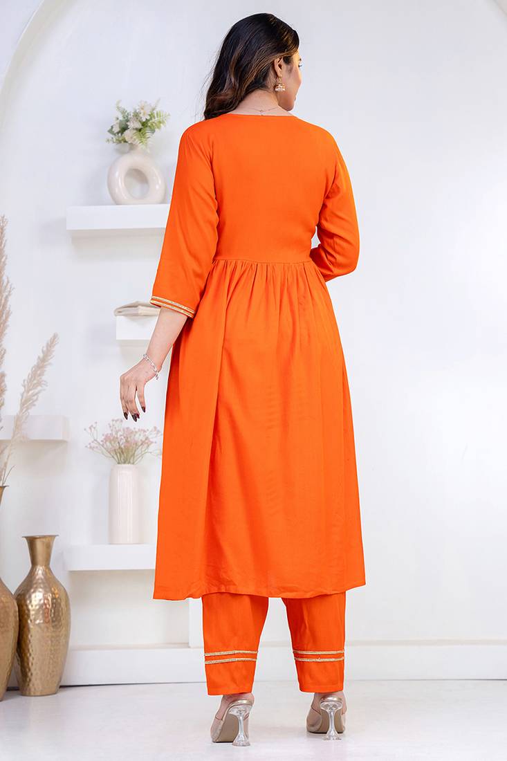 Orange lace solid rayon stitched v-neck flared pant suit set