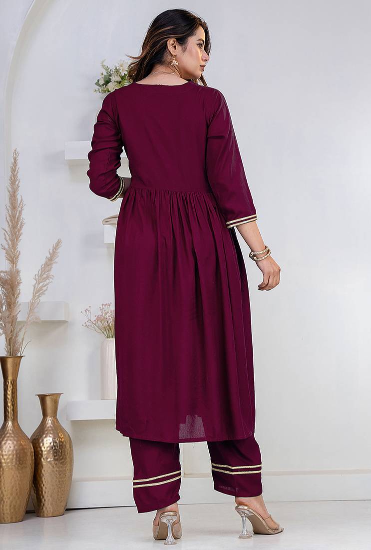 Purple lace solid rayon stitched v-neck flared pant suit set