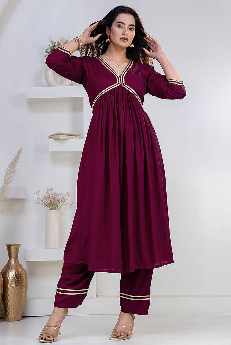 Purple lace solid rayon stitched v-neck flared pant suit set