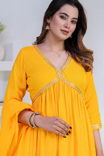 Mustard lace solid rayon stitched v-neck flared pant suit set