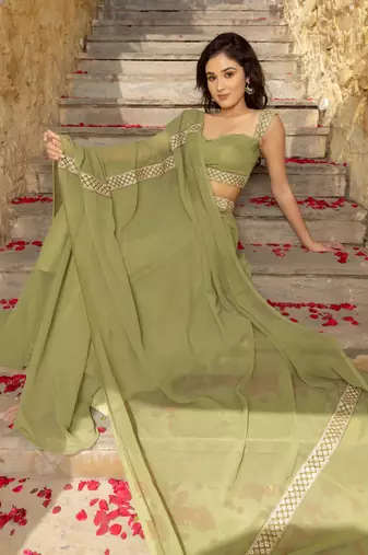 Dreamy Pastel Green festive charm and wedding-ready glam designed Lehenga Choli 
